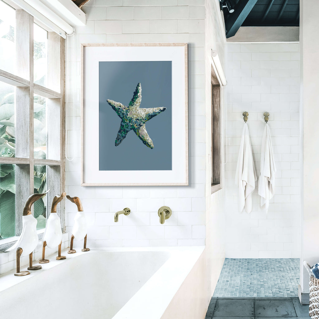 modern coastal bathroom with blue starfish art