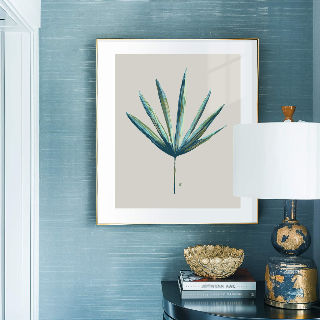 coastal living beach house with palm frond art