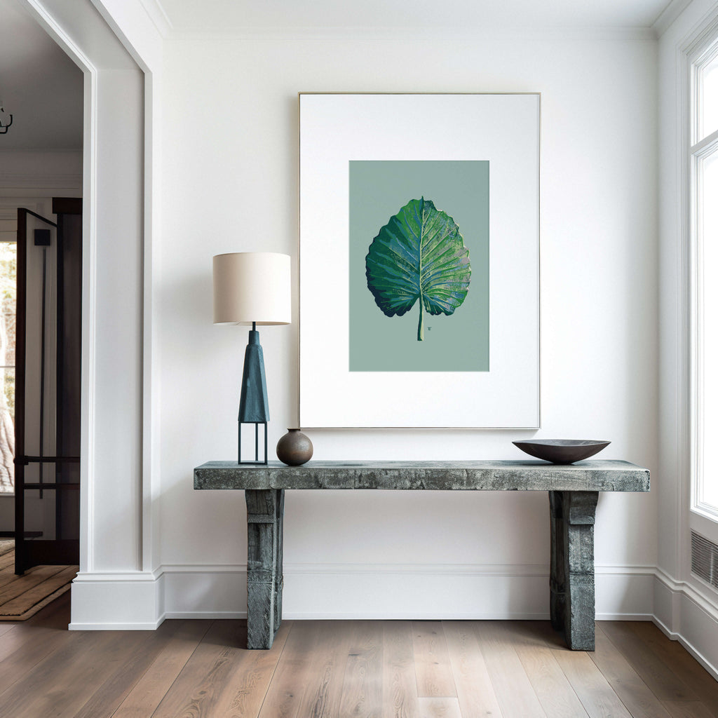 modern coastal house entryway with philodendron elephant's ear art in greens