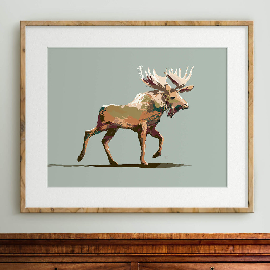 framed moose drawing in a burlwood frame