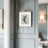 alligator art in preppy decor with blue-gray walls