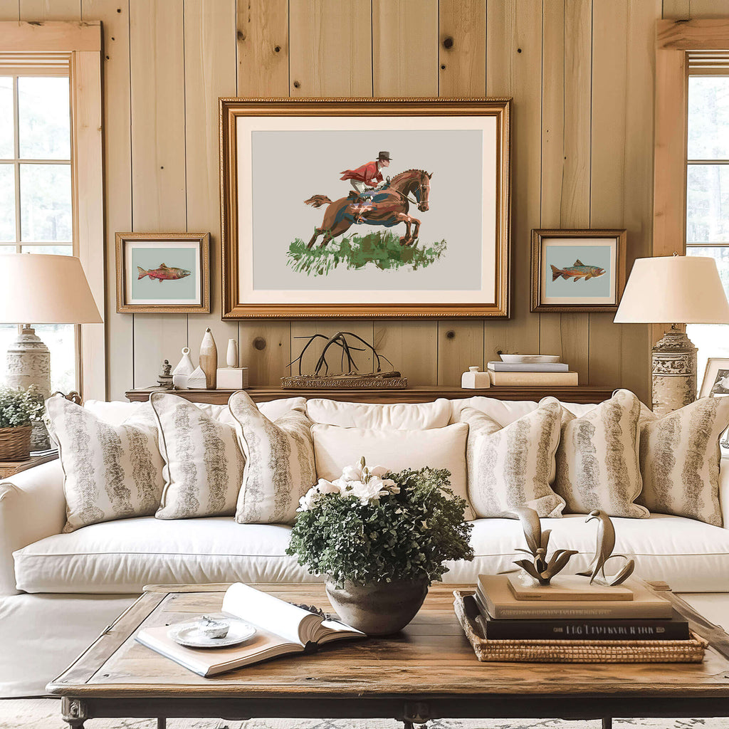 a living room in a high-end fox hunting lodge, there is a fox hunting artwork on the wood beam wall over the white sofa.