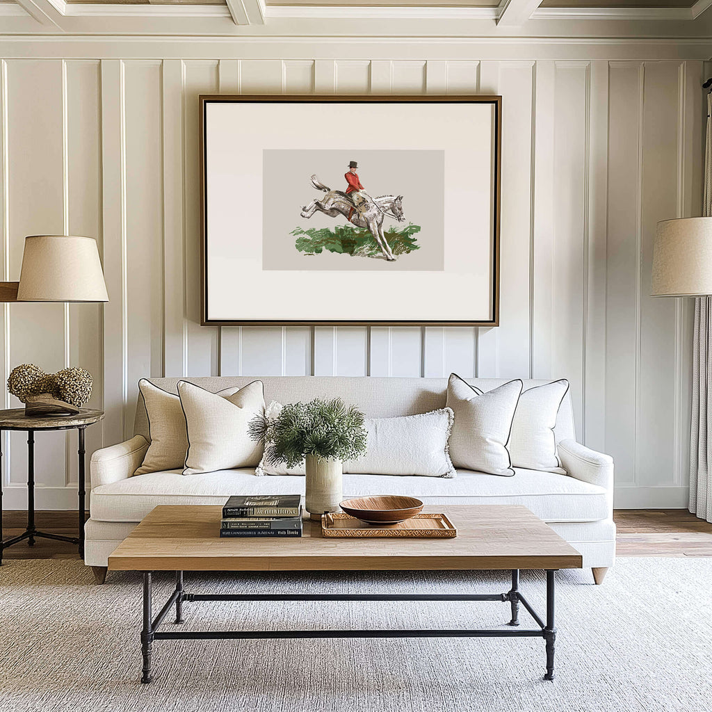 living room of a designer show house in Virginia, there is a modern fox hunting painting over the white sofa