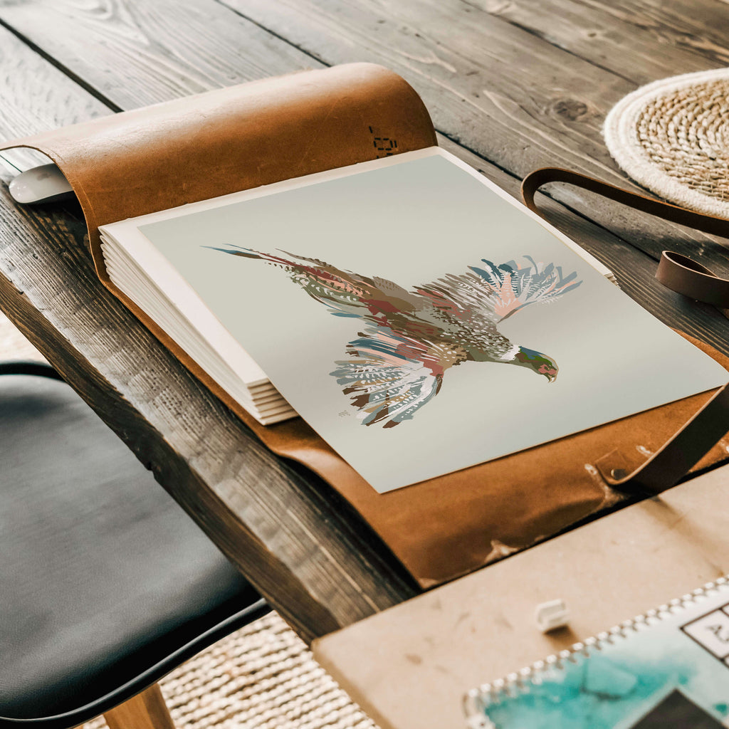 pheasant artwork print in a leather notebook
