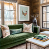 living room of a ski chalet in Vail, there is a drawing of a pheasant on the wall and a deer sculpture