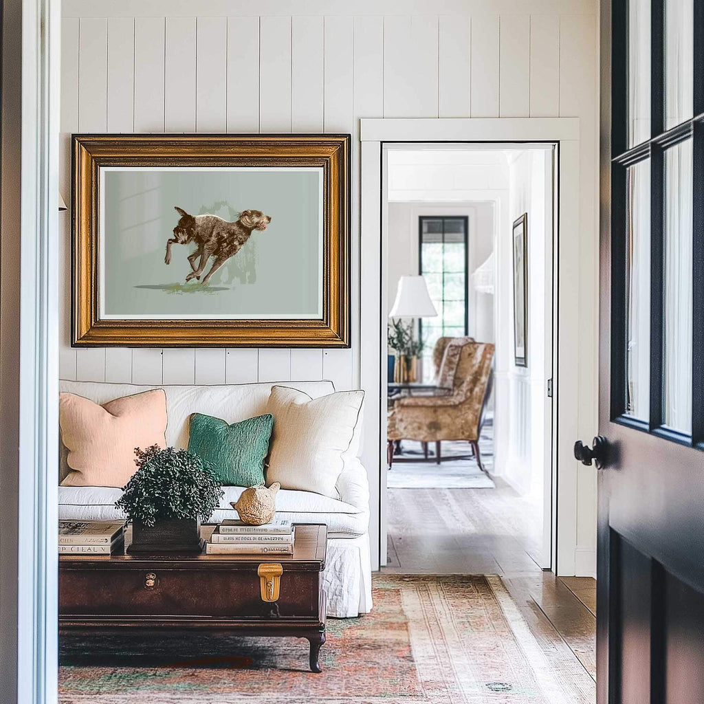 pointer griffon dog painting in a frame in a sitting room of an elegant home
