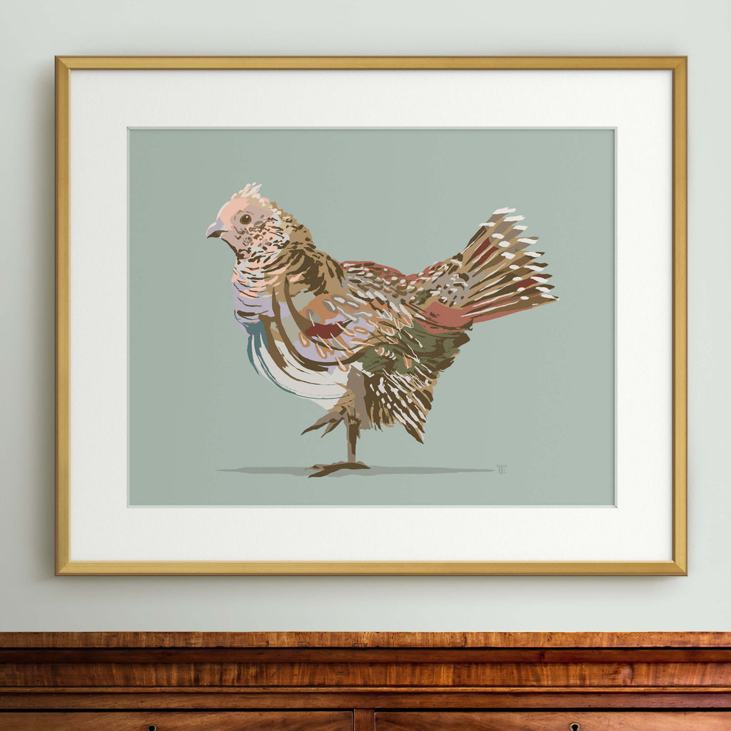 Painting of a ruffed grouse in a slim gold frame