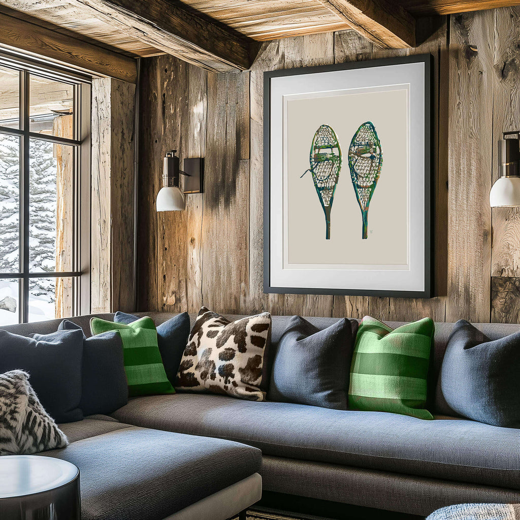 antique snowshoes art framed above a modern sofa in rustic ski lodge interior decor