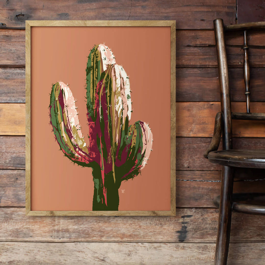 stylish cactus art print in rustic interior