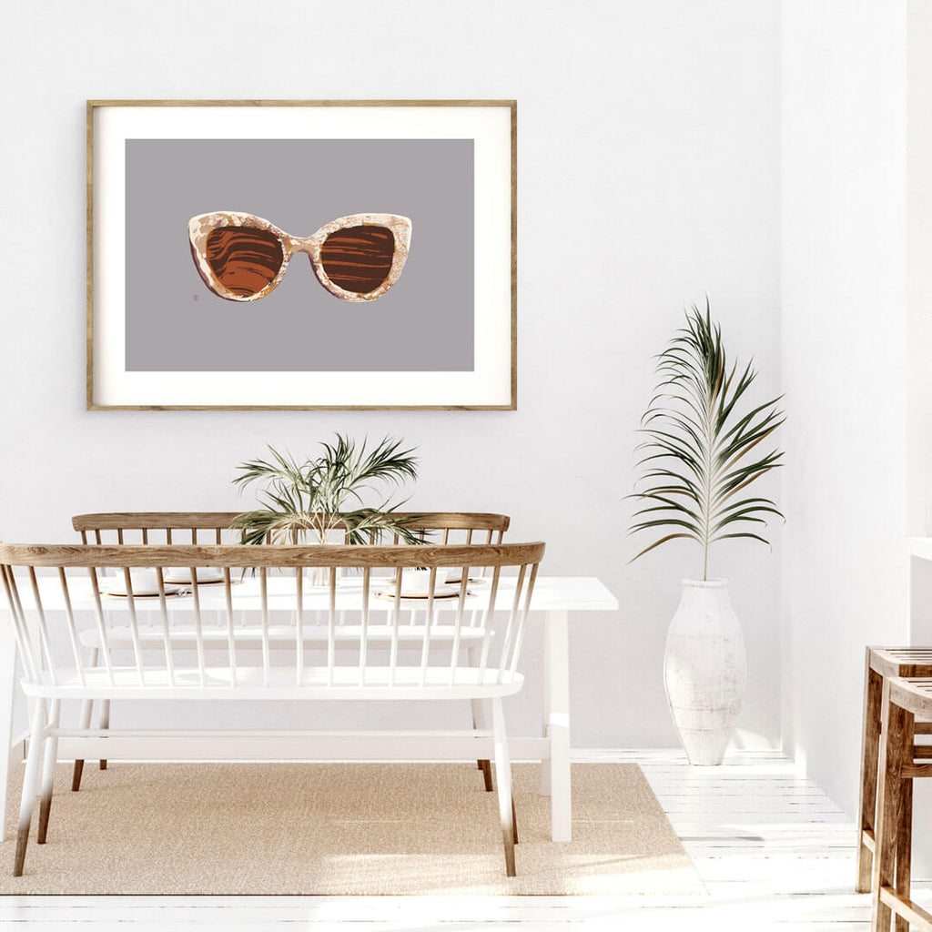 stylish women's sunglasses painting in dining room