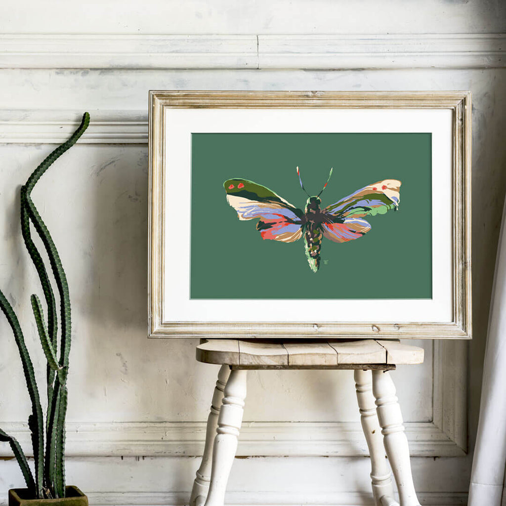 colorful moth painting in rustic room